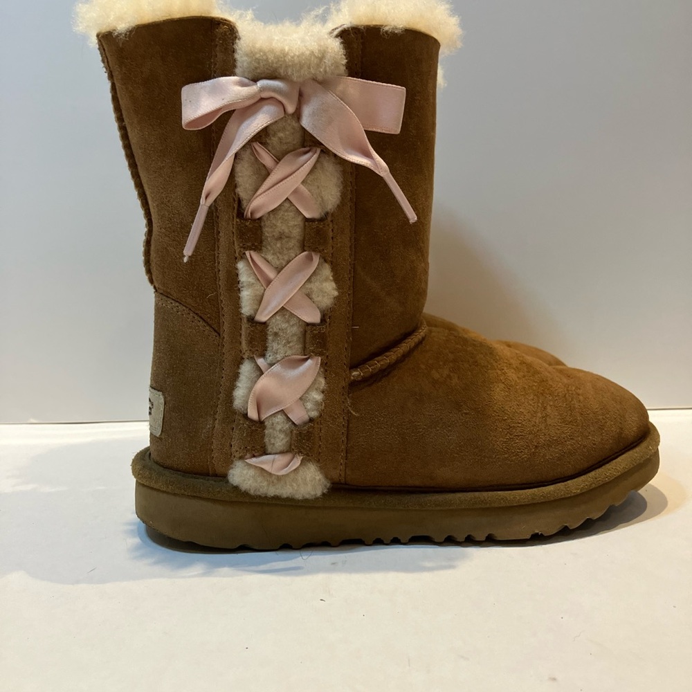 UGG Tan Suede Boots with pink bows and cream trim